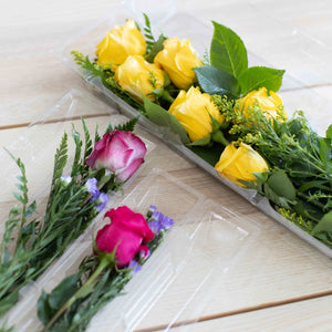 Clear rose boxes with flowers