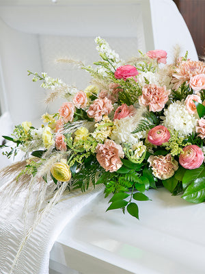 Green Casket Saddle with flowers zoomed