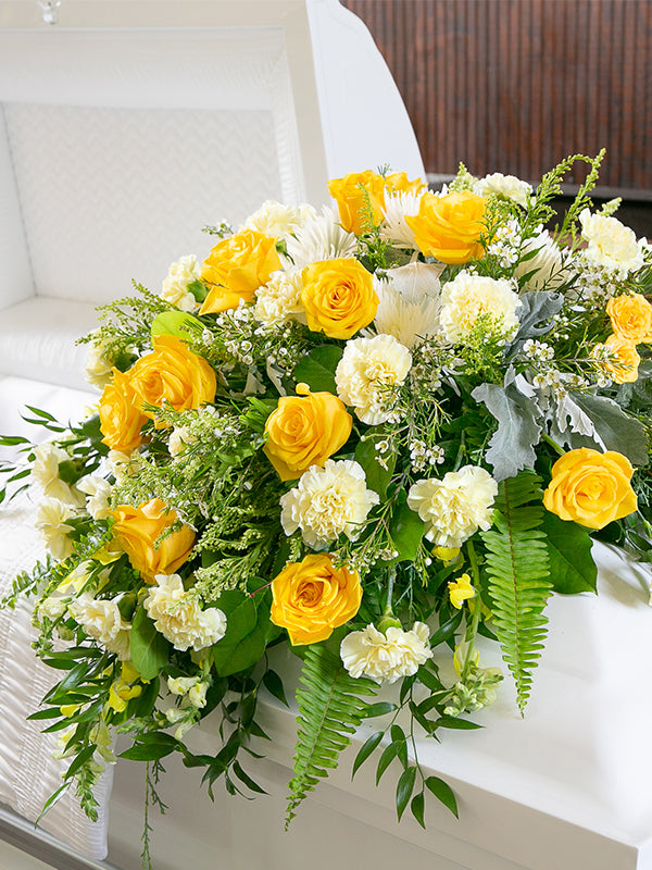 Green Casket Saddle with yellow flowers