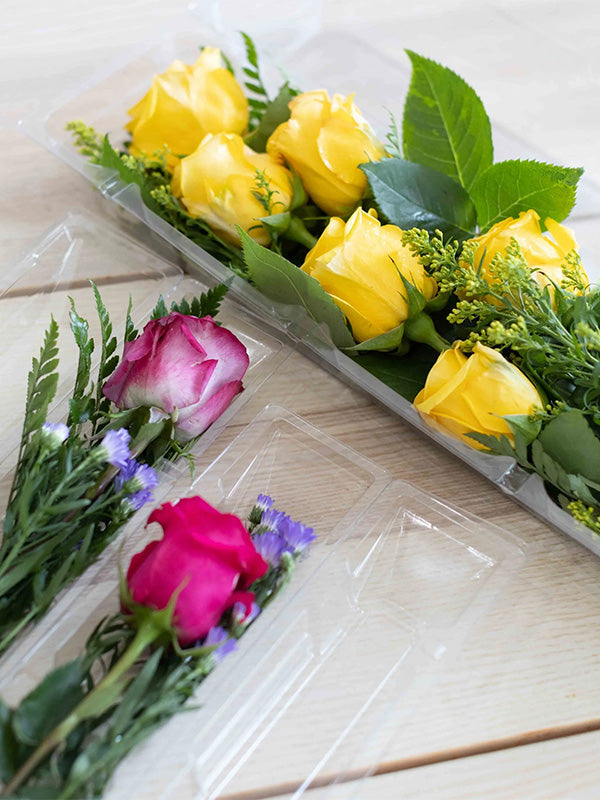 Clear Dozen Rose Box with yellow roses and Small Single Rose Box with pink roses