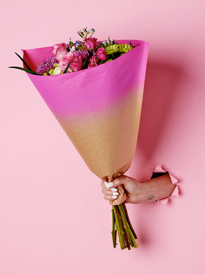 Elm Sleeve in Hot Pink, lifestyle image with flowers