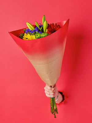 Elm Sleeve in Red, lifestyle image with flowers