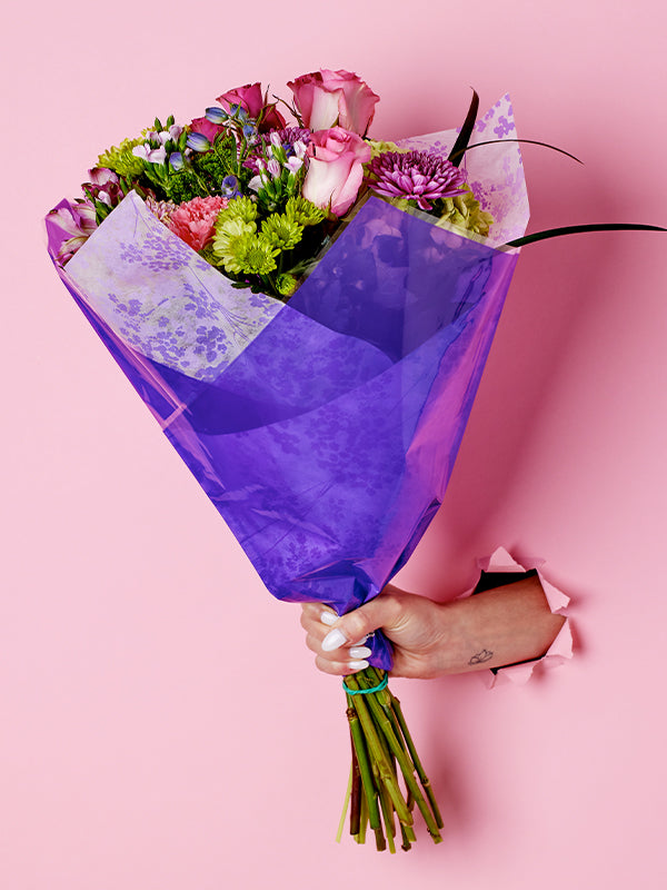 Fiona Prefold in Purple, lifestyle image with flowers