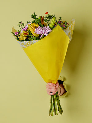 Fiona Prefold in Yellow, lifestyle image with flowers