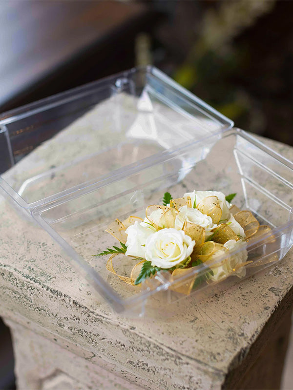 Large clear corsage box with white roses