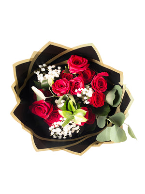 Aerial shot of Madonna Wrap in black with red flowers