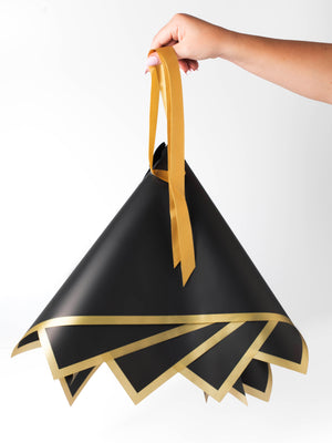 Madonna Wrap in black hanging upside down
