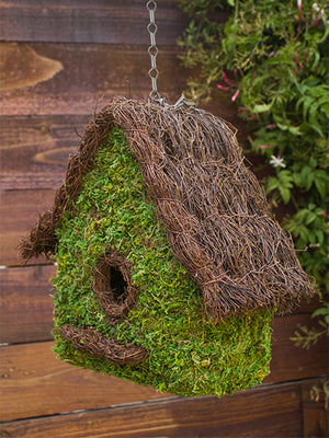 Maison Woven Birdhouse hanging outside