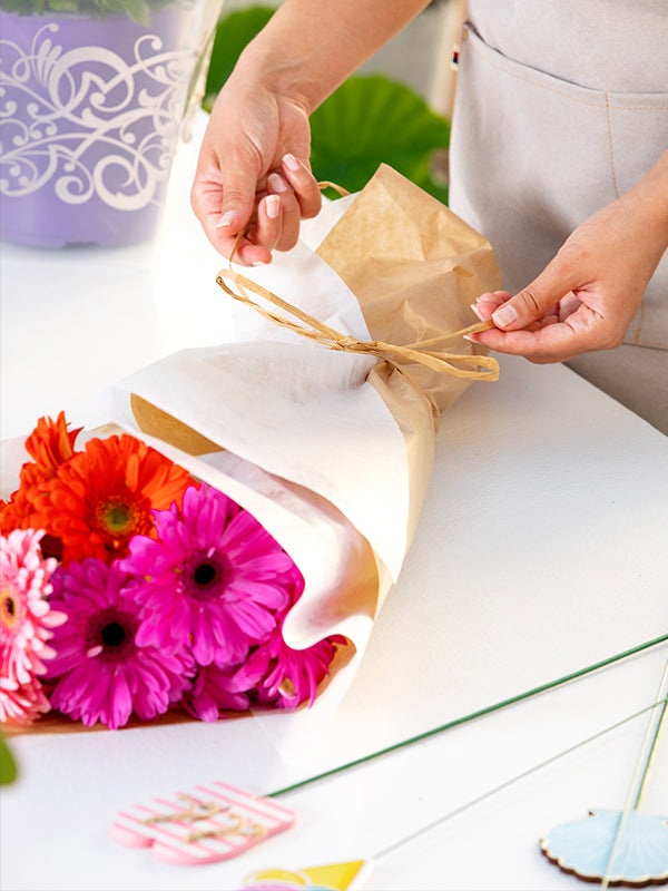 Florist wrapping flowers
